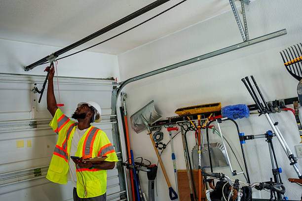 Professional Garage Door Panel Replacement technician working in Sesser, IL